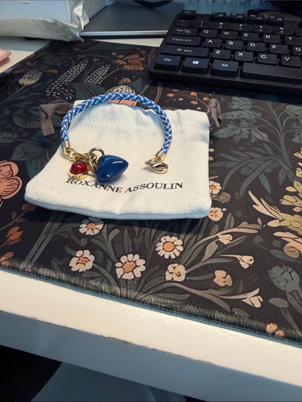 Roxanne Assoulin Blue Braided Bracelet with Heart and Red Charm